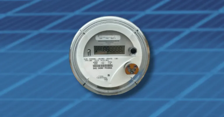 photo of Duke Energy electric meter with a solar panel in the background