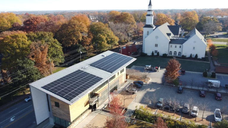 Aerial drone view of rooftop solar system on the AIA building in Raleigh, NC