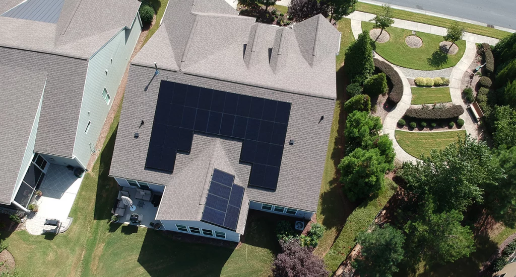 Aerial view of a home with solar in Durham, NC