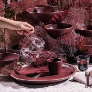 The Pumia clear glass Tea Pot surrounded by east fork pottery