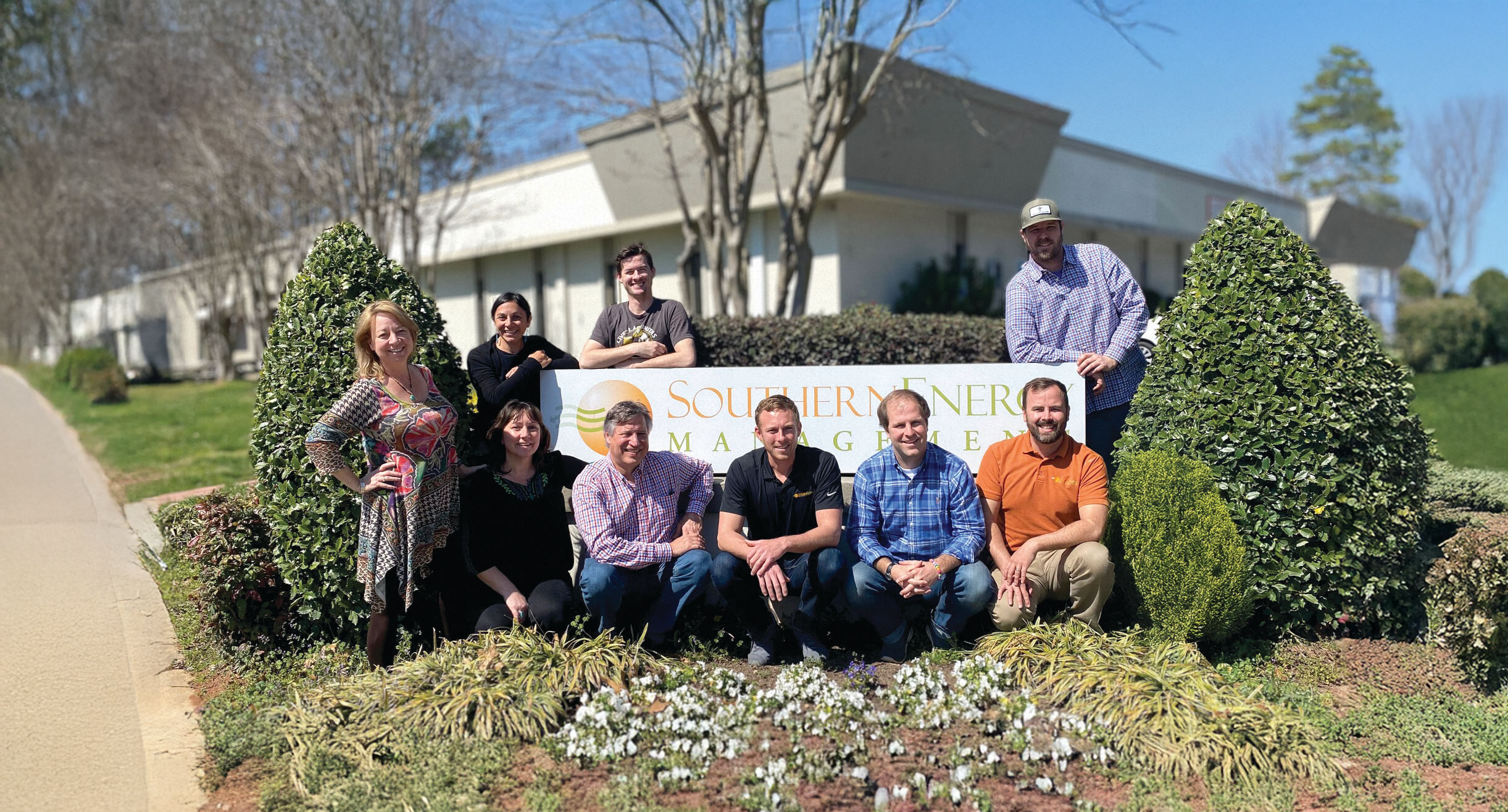 Co-Founders Bob and Maria Kingery stand outside Southern Energy Management's headquarters with the new ownership team