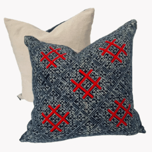 A black and red patterned pillow from Loom Imports