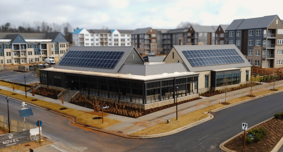 Solar system installed on rooftop of community amenity at NOVEL River District by Crescent Communities in Charlotte, North Carolina