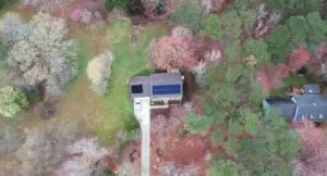 Aerial view of a home with a roof mounted solar system