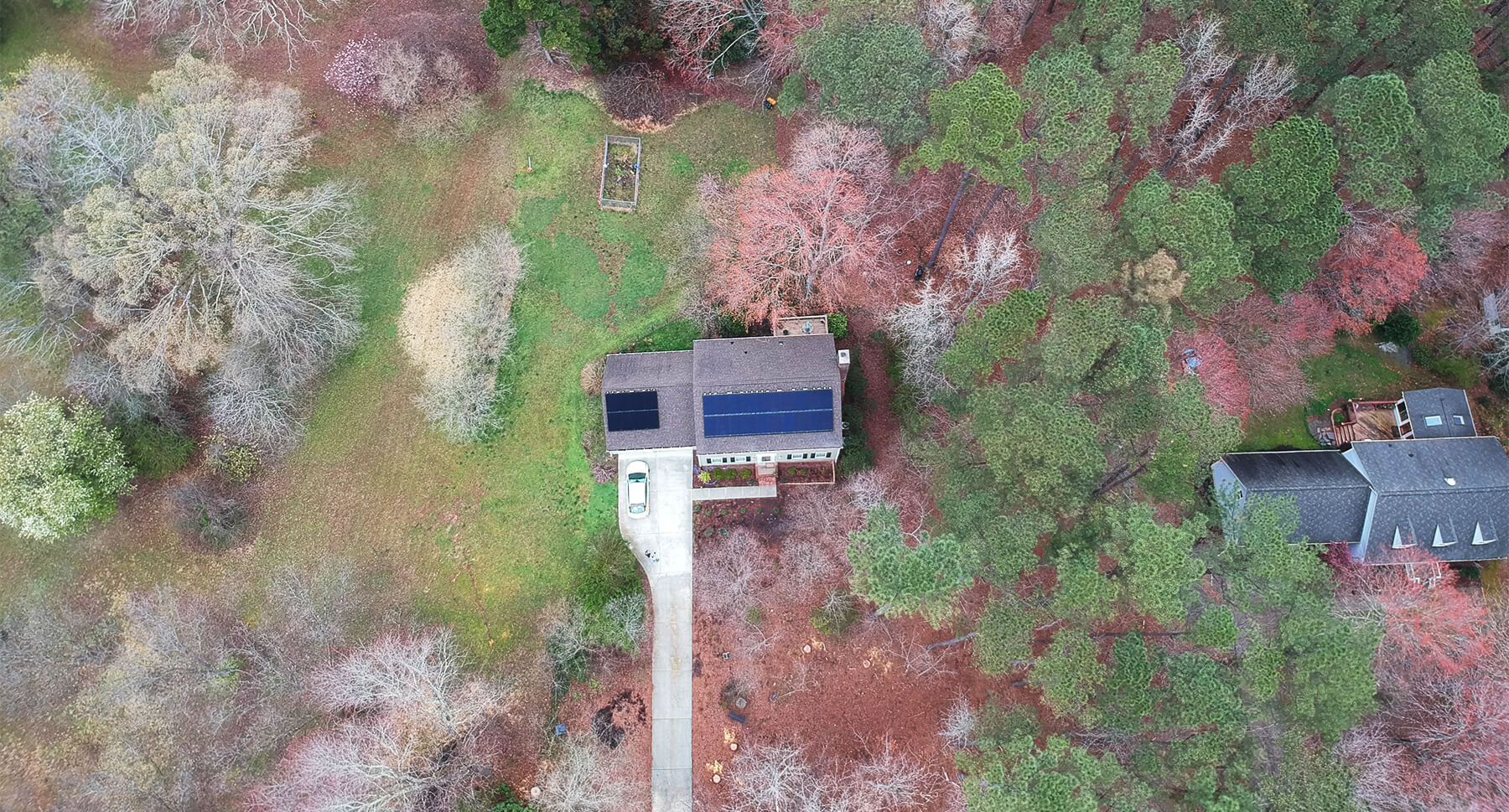 Aerial view of a home with a roof mounted solar system