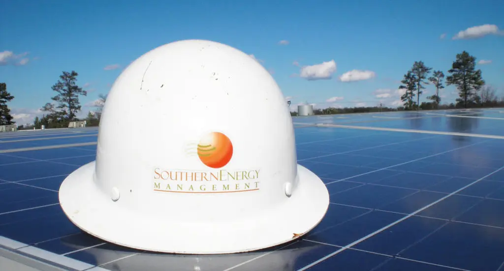Southern Energy Management hardhat on solar panel