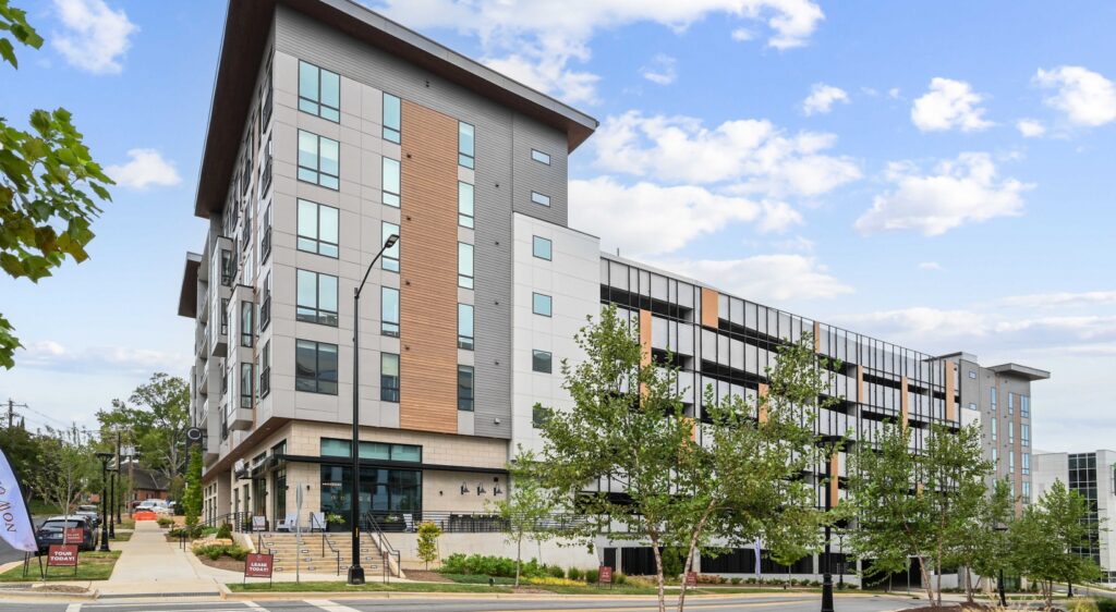 Exterior of the Solis Midtown apartment complex, featuring a modern design and certified by Southern Energy Management for Fitwel and NGBS Silver.