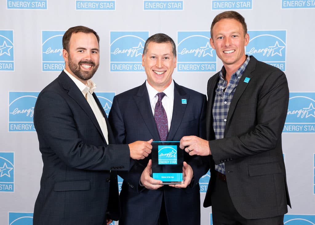 Taylor and Daniel accepting the 2019 Energy Star Partner of the Year Award