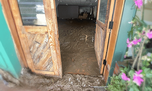 The flooded entrance of the Squirrel and Nut in WNC post hurricane damage