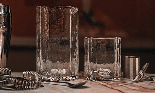 A hand forged glass pitcher with matching tumbler from Terrane Glass Co