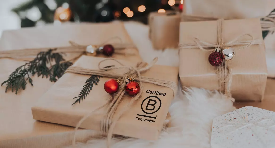 Gift wrapped in brown paper with a Certified B Corporation gift tag