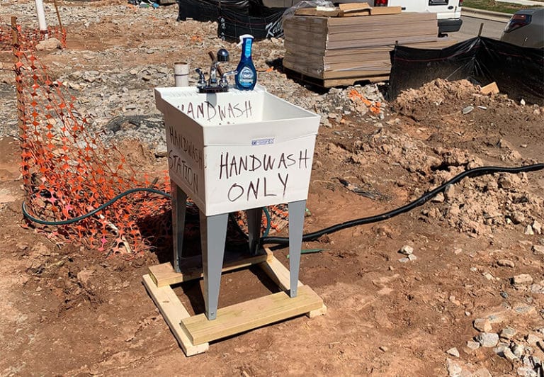 Hand washing station on a construction site during COVID-19