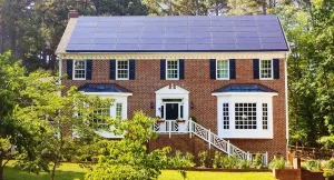 Colonial brick home with roof top solar system