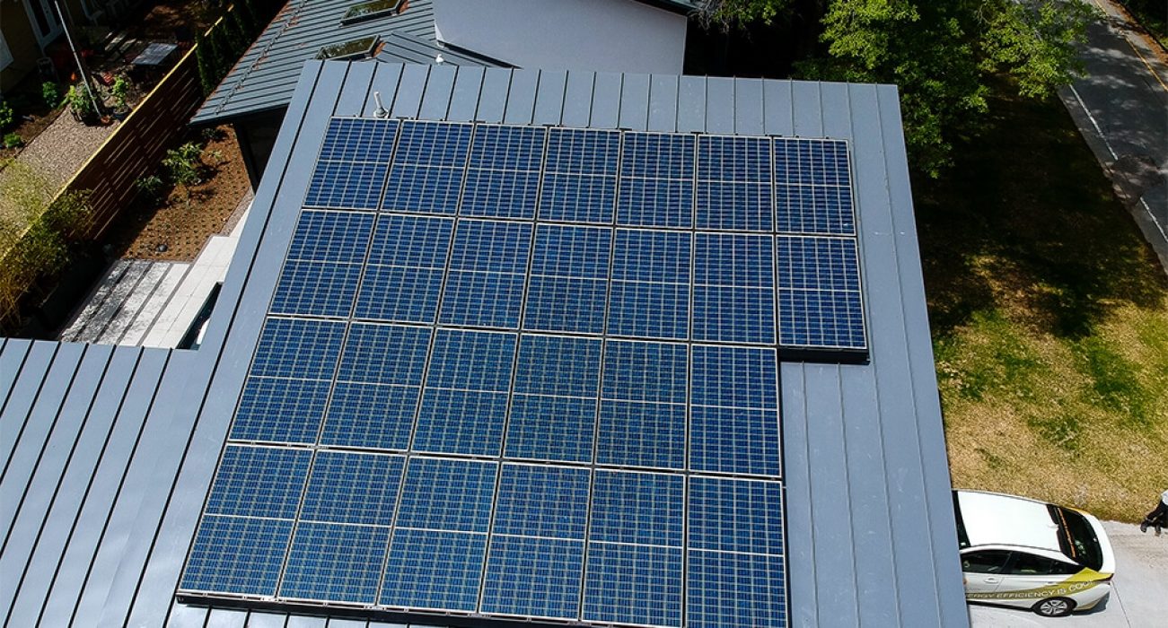 Detail view of a polychrome solar system installed on a metal roof