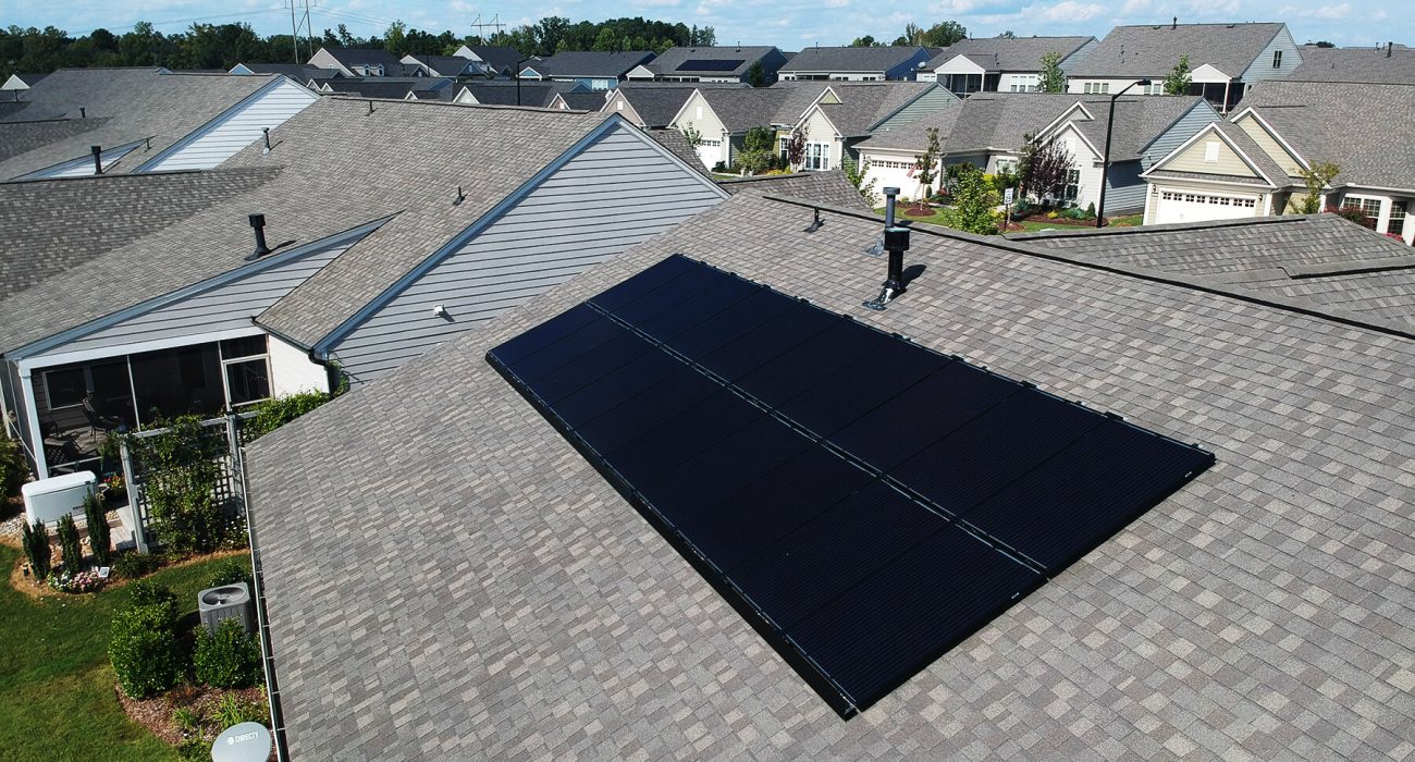 Close up shot of a mono panel solar system on a roof