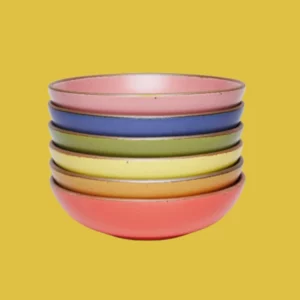 Stack of rainbow colored bowls from East Fork