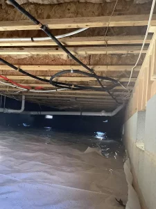 Vented crawl space with vapor barrier installed