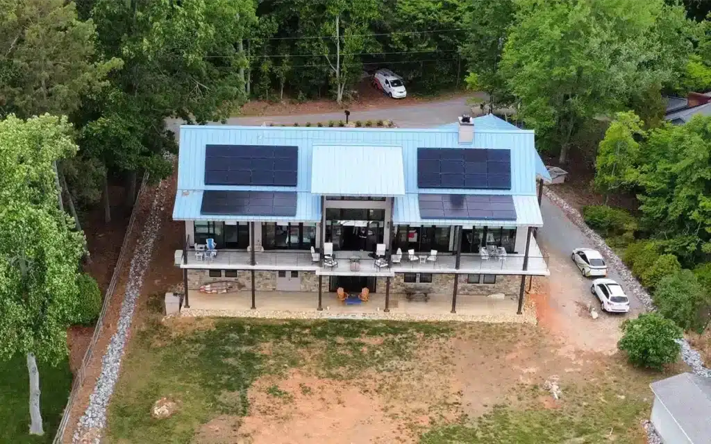 aerial view of a net-zero home with solar on a lake in North Carolina