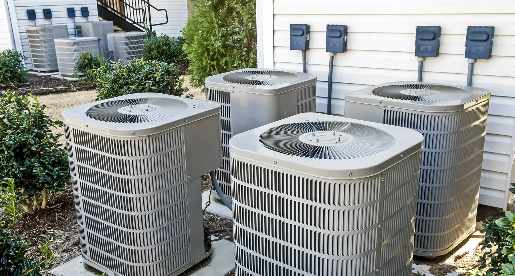 HVAC units outside of a multifamily apartment building