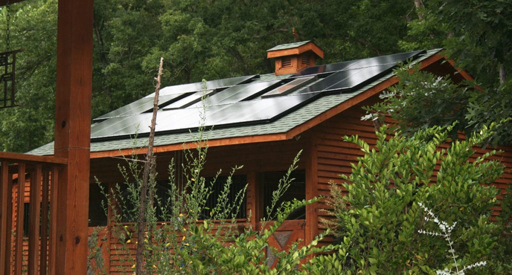 Solar on a natural wood barn in the forrest