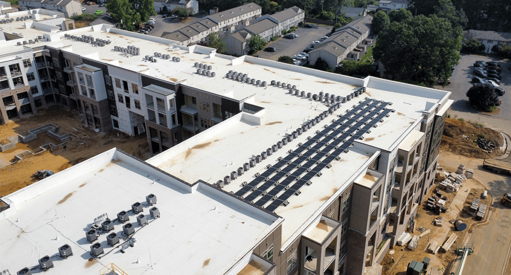 Aerial view of rooftop solar on Providence Row apartments in Charlotte, NC