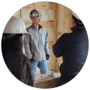 Robert, building performance expert, from southern energy management leading an on-site training at a new construction build about building performance