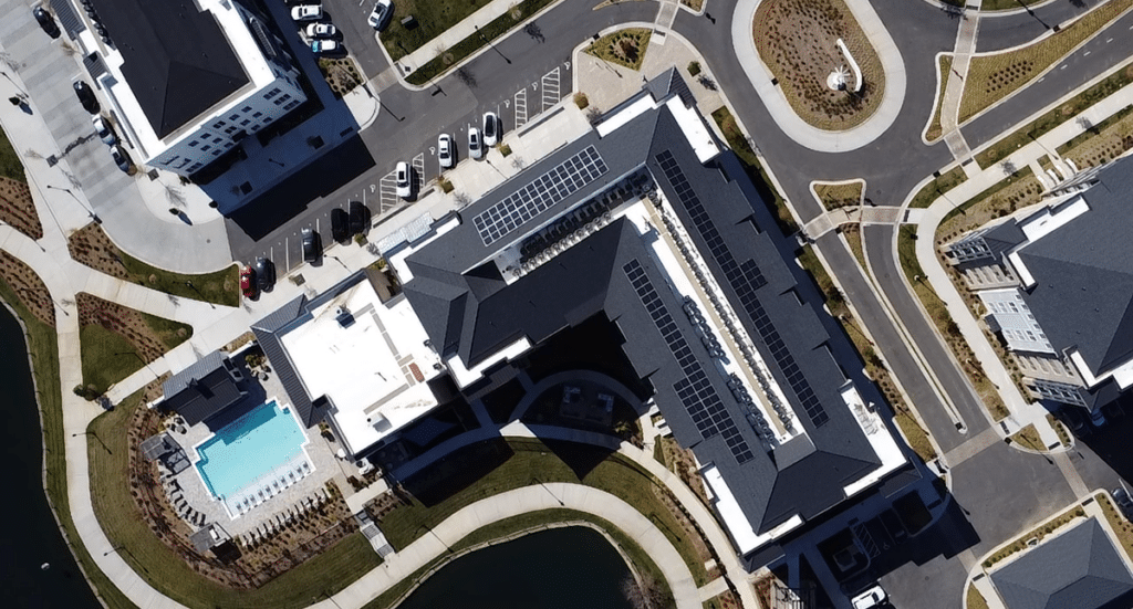 Aerial view of solar panel system installed on the roof of NOVEL University Place in Charlotte, NC