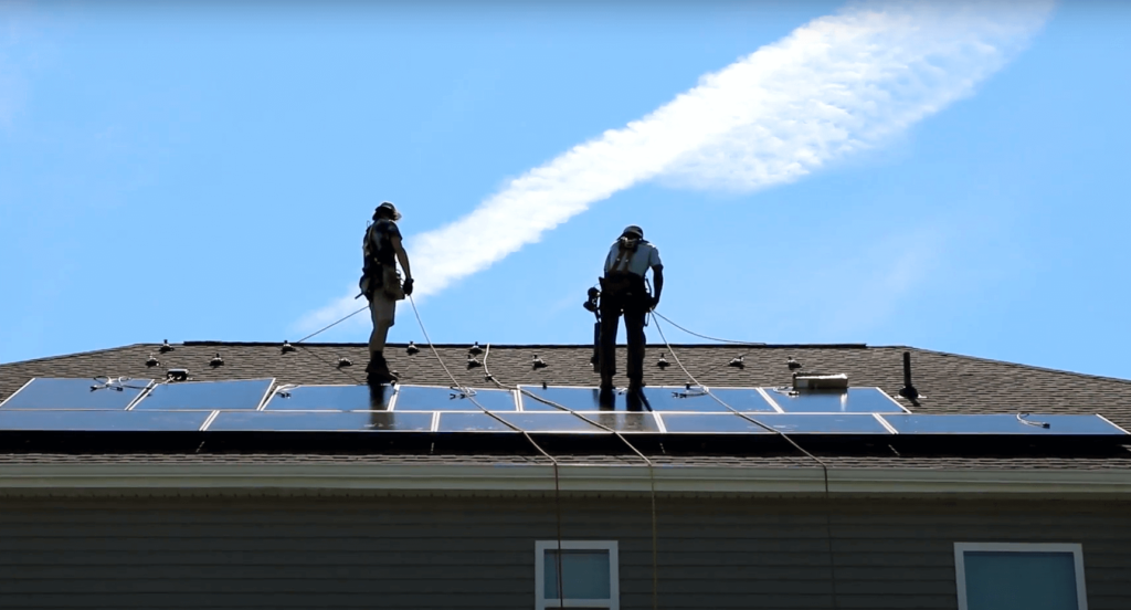 Southern Energy Management solar team installing panels on a roof
