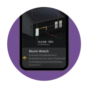 Cell phone displaying Tesla Powerwall app with Storm Watch alert