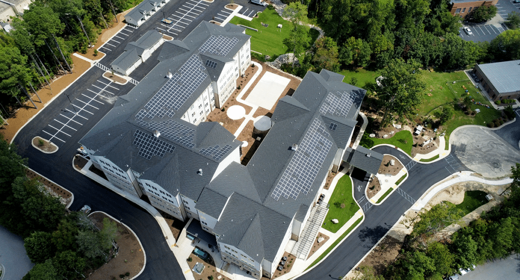 Aerial view of solar system installed on the roof of The Lawsom of Knightdale apartment complex in Knightdale, NC