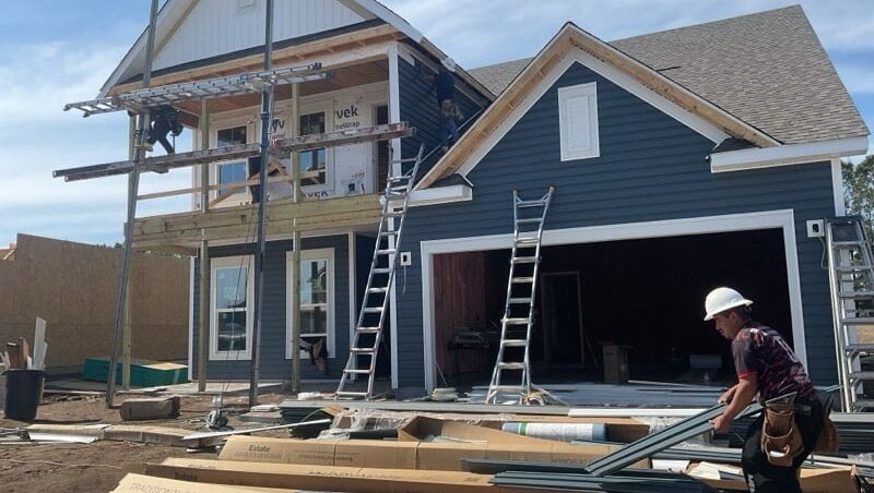 Blue home being built in Wilmington, NC