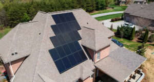 Close up view of a mono panel solar system on an angled roof
